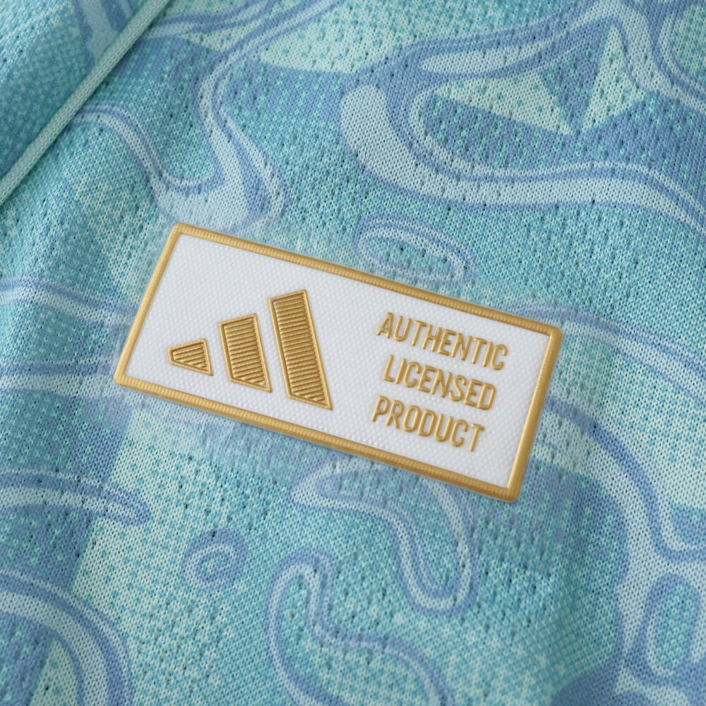 Close-up of Juventus Away 2025/26 Player Version jersey with Adidas Authentic Licensed Product badge.