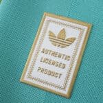 Close-up of the Authentic Licensed Product patch on the Liverpool Third 2025/26 Player Version jersey.