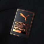 Close-up of the Authentic Licensed Football badge on the Manchester City Away 2025/26 Player Version jersey.