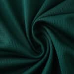 Close-up of Palmeiras 2025/26 Home Fan Version jersey fabric in dark green, showing texture and weave.