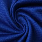 Close-up of blue Rangers Home 2025/26 fan jersey fabric showing texture and weave pattern.