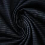 Close-up of navy blue striped fabric, Real Madrid Away 2025/26 Fan Version jersey material.