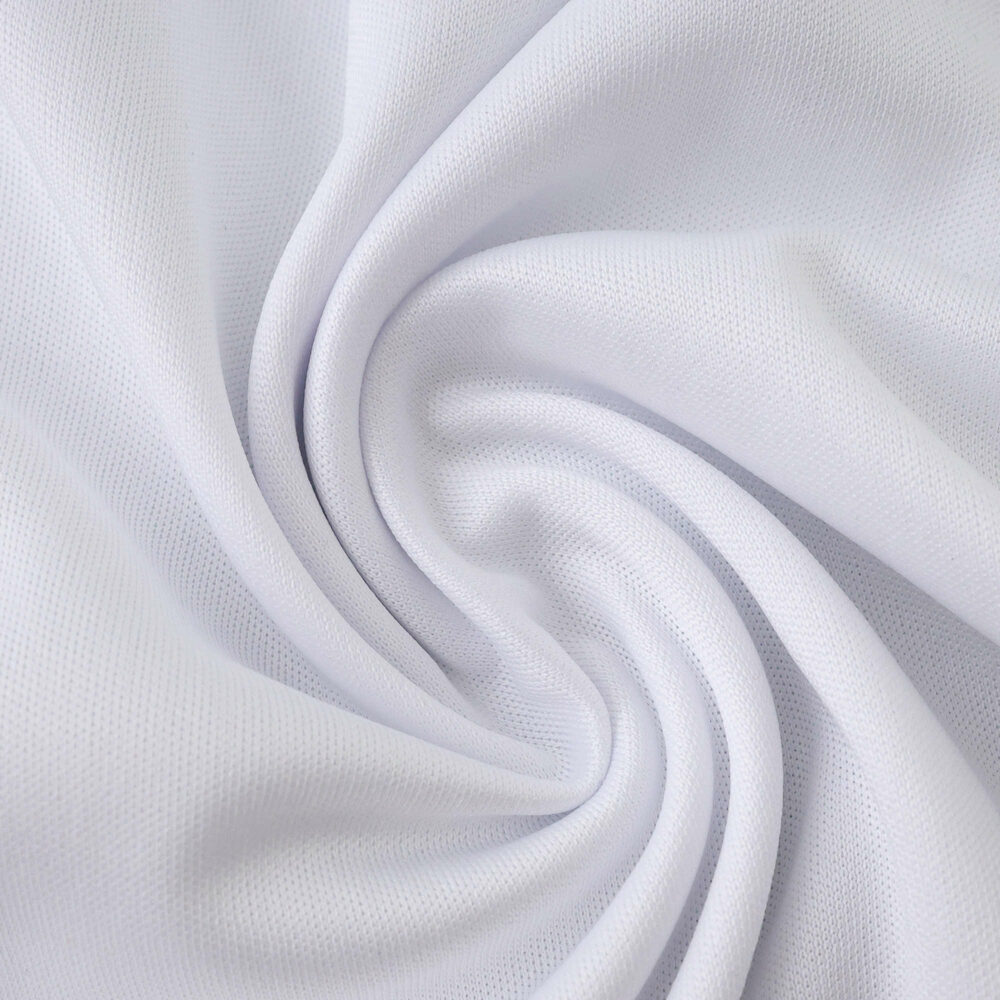 Close-up of Real Madrid Home 2025/26 Fan Version jersey fabric in white, showing smooth texture and weave.