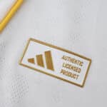 Close-up of the "Authentic Licensed Product" badge on the 2025/26 Real Madrid Home Player Version jersey.