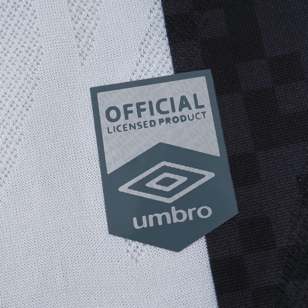 Umbro official licensed product tag on Santos FC Away 2025/26 Fan Version jersey fabric.