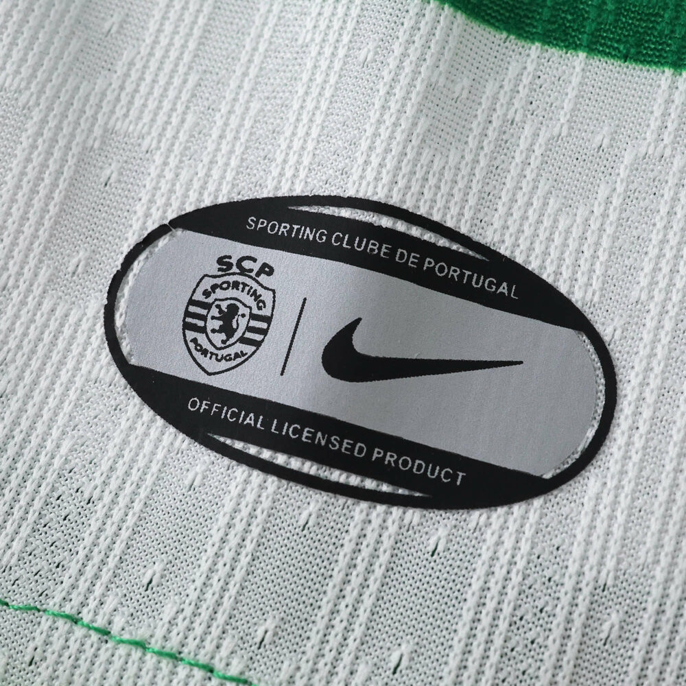 Close-up of Sporting CP 2025/26 home jersey badge showing club crest and Nike logo, official player version.