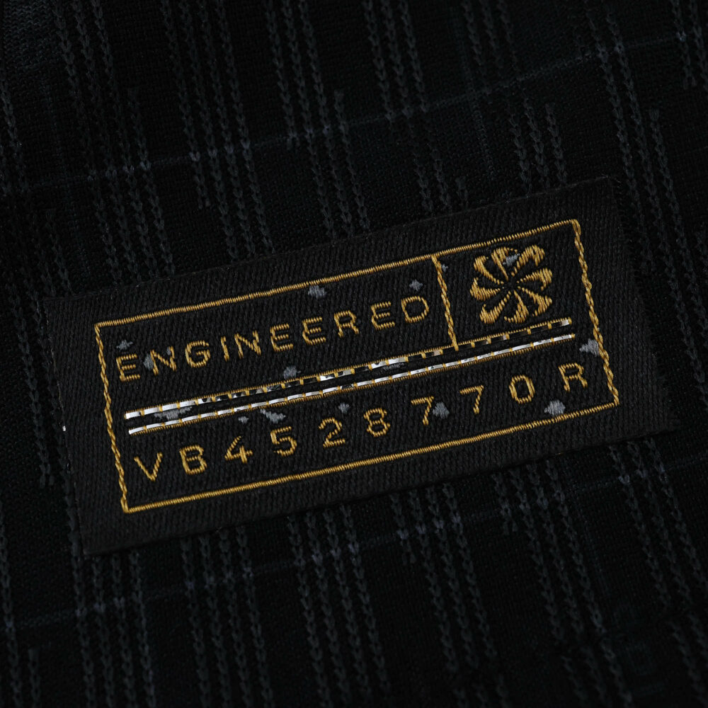 Close-up of the "Engineered" label on the Tottenham Hotspur 2025/26 Away Player Version jersey.