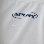 Close-up of Tottenham Hotspur 2025/26 Home Player Version jersey with Spurs and Nike logos.