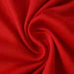 Close-up of red fabric used for the Union Berlin Home 2025/26 Fan Version jersey, showing texture and material.