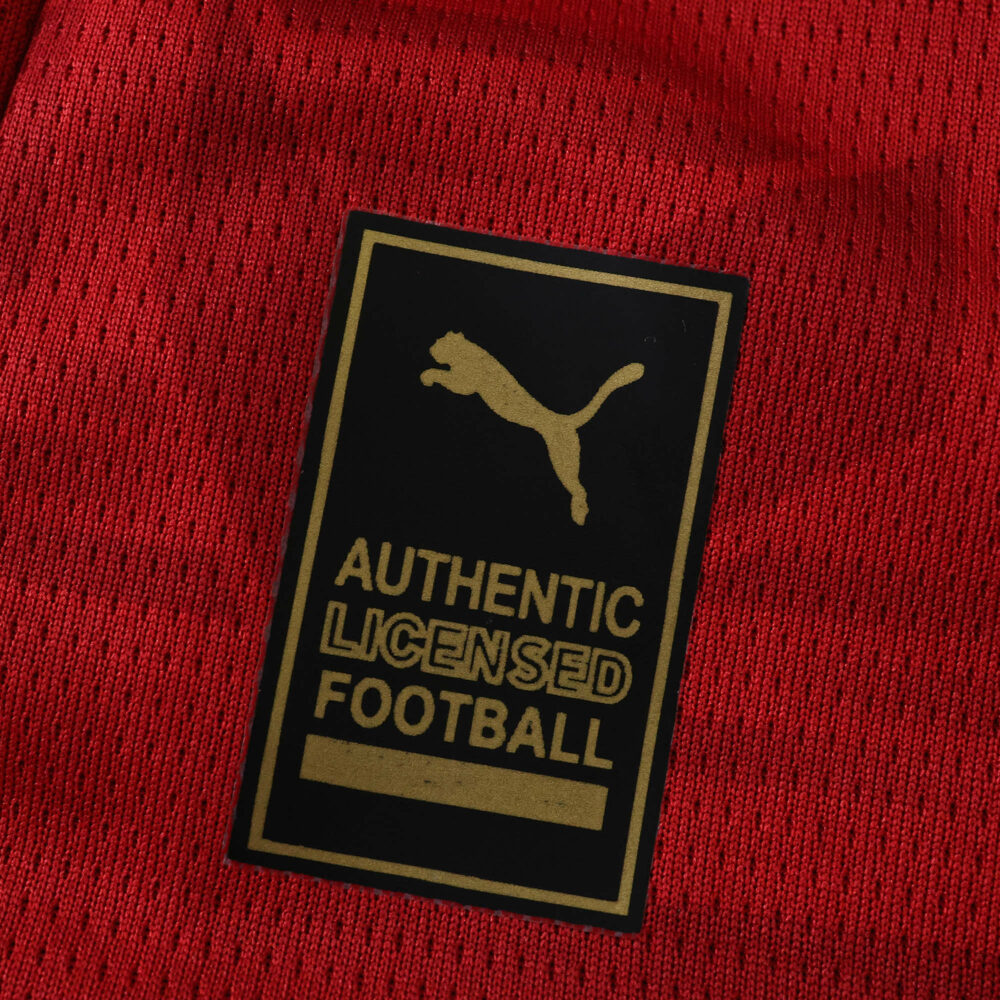 Close-up of the Puma Authentic Licensed Football label on the Valencia Away 2025/26 Fan Version jersey.
