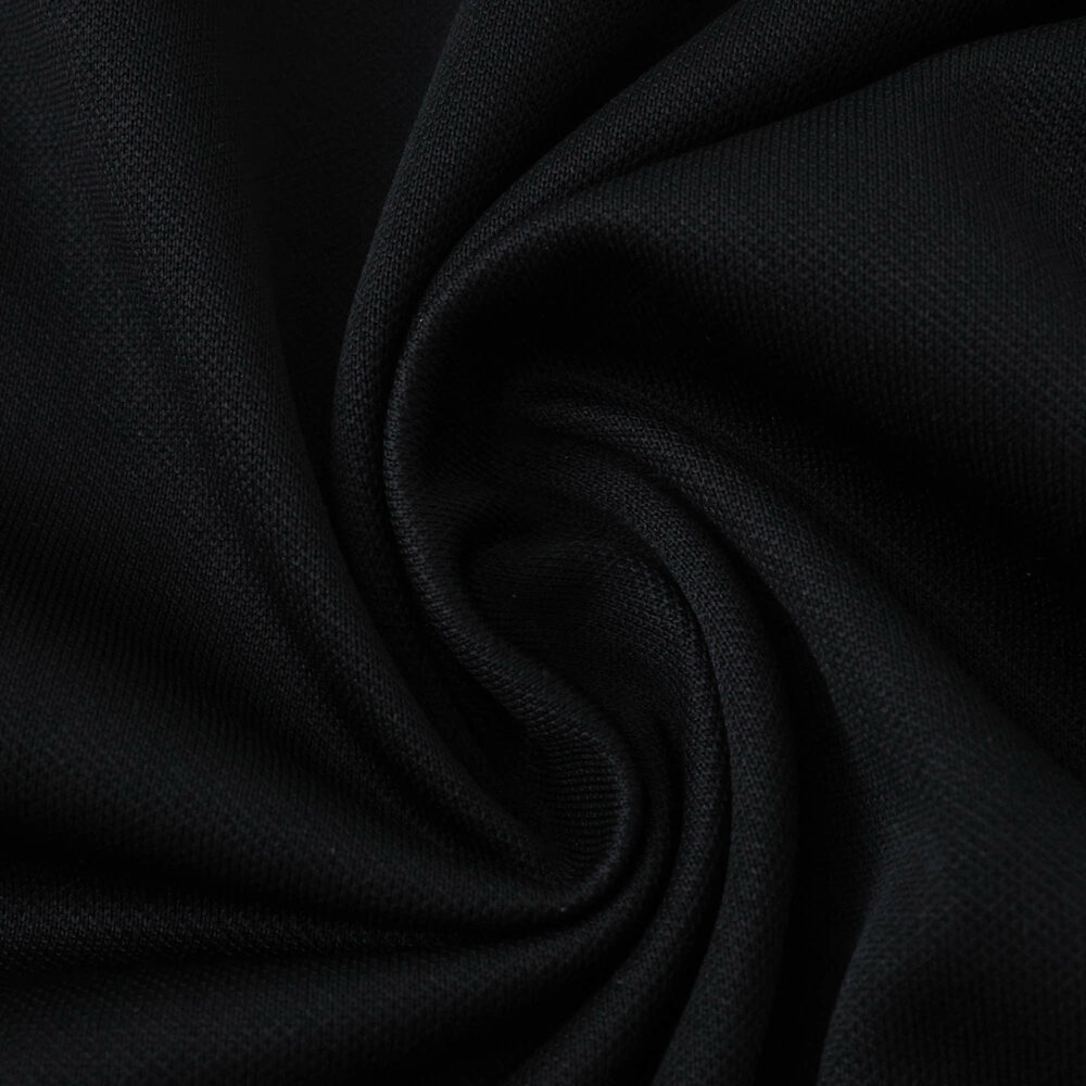 Close-up of the black fabric used for the Aberdeen Away 2025/26 Fan Version jersey.