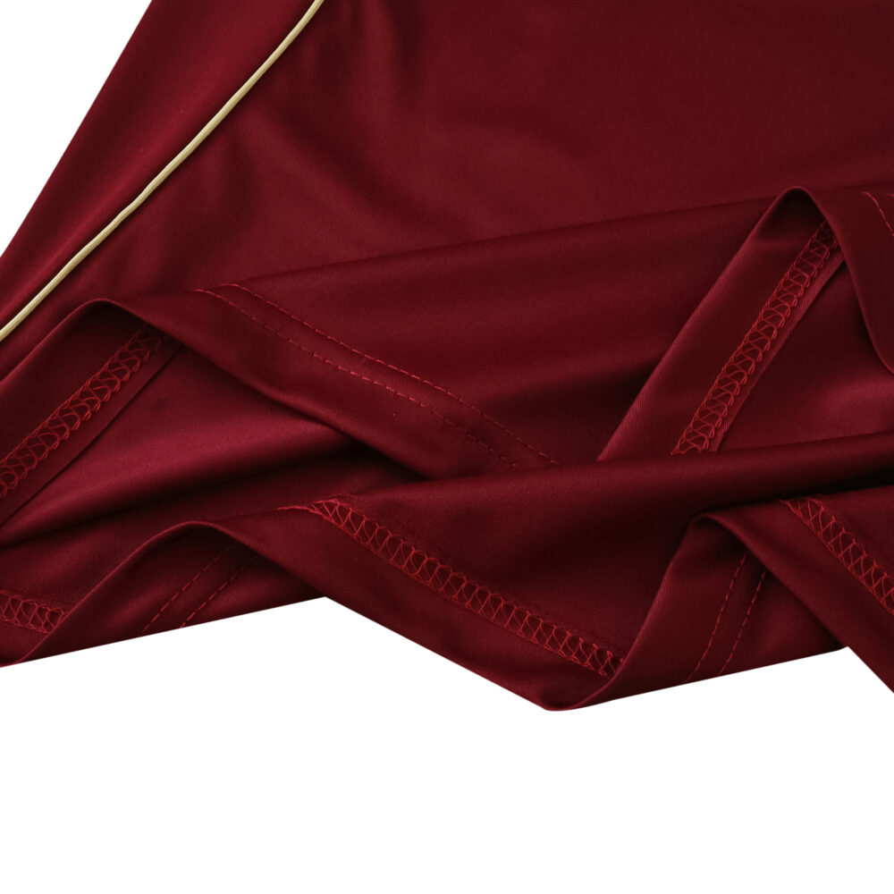 Close-up of the maroon fabric and stitching on the Aston Villa Home 2025/26 Fan Version jersey.
