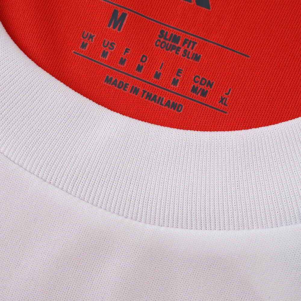 Close-up of the Bayern Munich 2025/26 Home Fan Version jersey collar and inner neck label.