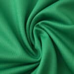 Close-up of green Borussia Monchengladbach Away 2025/26 Fan Version jersey fabric with subtle texture.