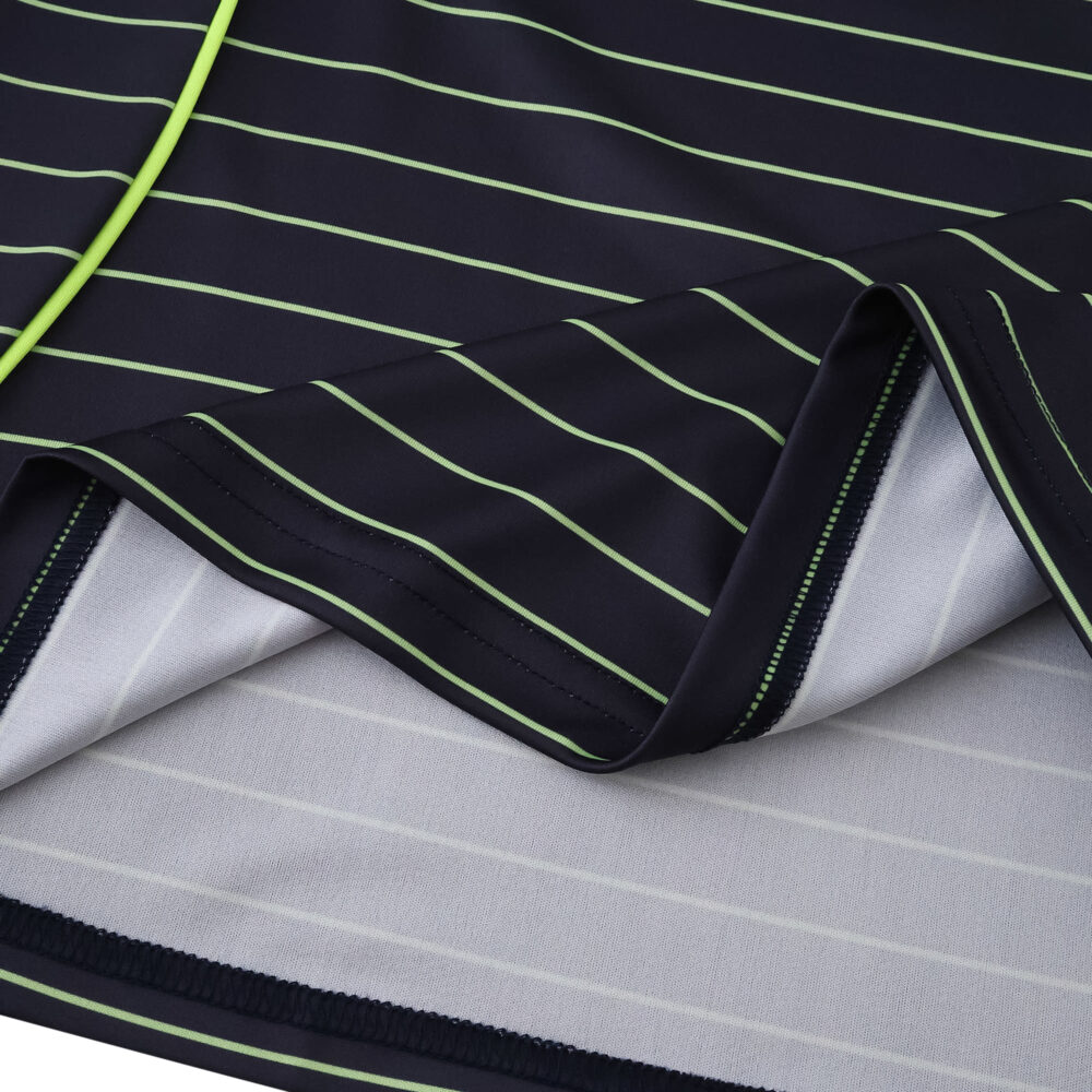Close-up of 2025/26 Celtic Away Fan Version jersey showing navy fabric with green pinstripes and stitching.