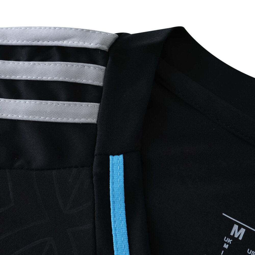 Close-up of Charlotte FC Away 2025/26 Fan Version jersey showing collar and shoulder details.