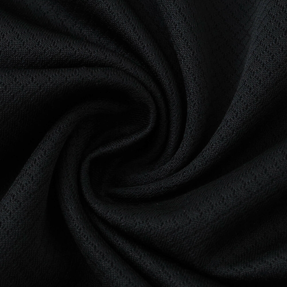 Close-up of the black fabric texture used in the Corinthians Away 2025/26 Fan Version jersey.