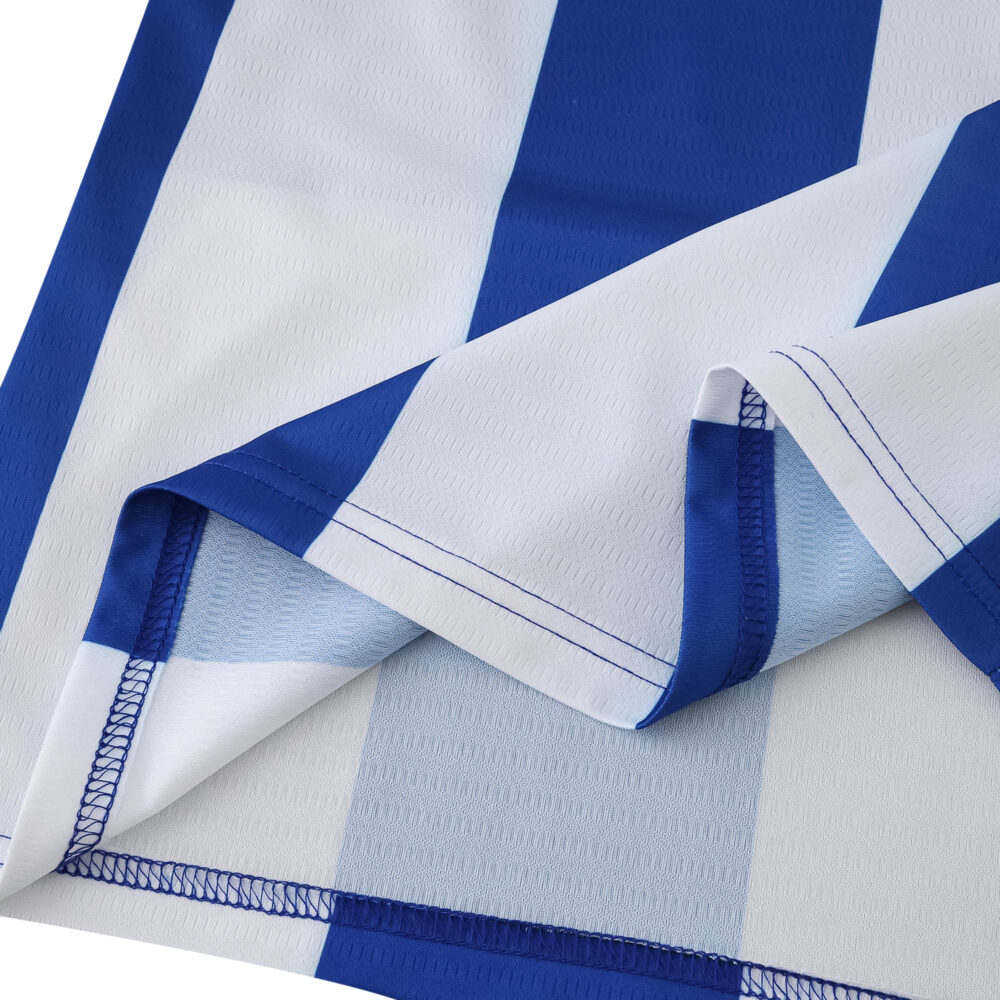 Close-up of FC Porto Home 2025/26 Fan Version jersey fabric with blue and white vertical stripes.