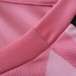 Close-up of the pink collar and shoulder detail on the Inter Miami CF Home 2025/26 Fan Version jersey.
