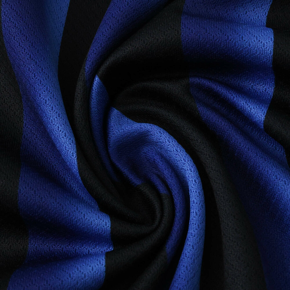 Close-up of Inter Milan 2025/26 home fan jersey fabric with blue and black vertical stripes.