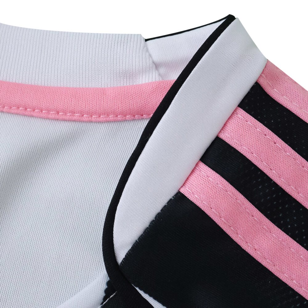 Close-up of the collar and shoulder detail on the Juventus 2025/26 Home Fan Version jersey, featuring pink and black stripes.