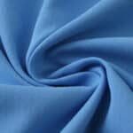 Close-up of the 2025/26 Manchester City home player version jersey fabric in sky blue.