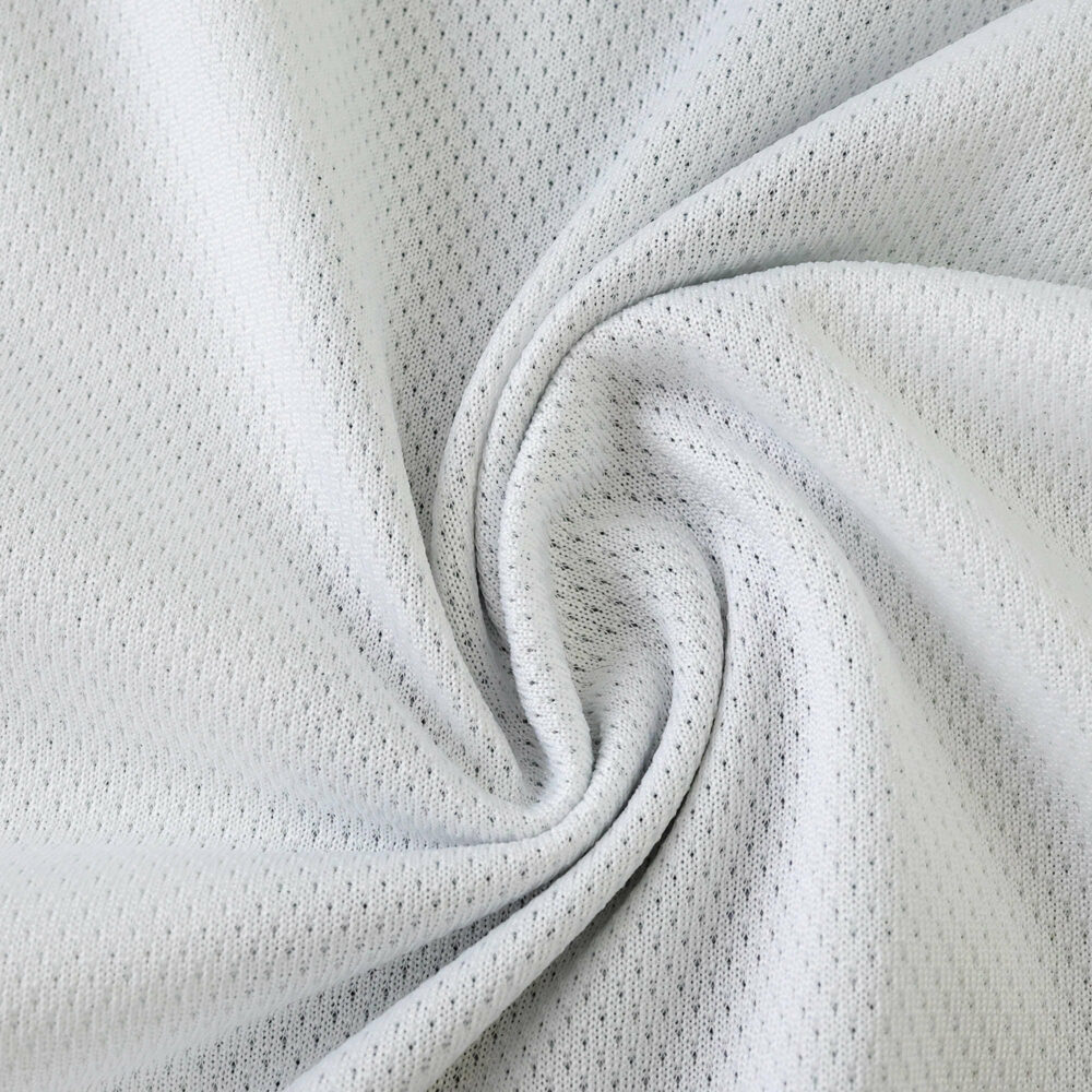 Close-up of Newcastle United 2025/26 Home Player Version jersey fabric, showing texture and stitching detail.