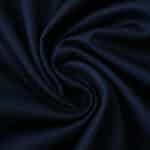 Close-up of Paris Saint-Germain 2025/26 home fan version jersey fabric in deep navy blue.