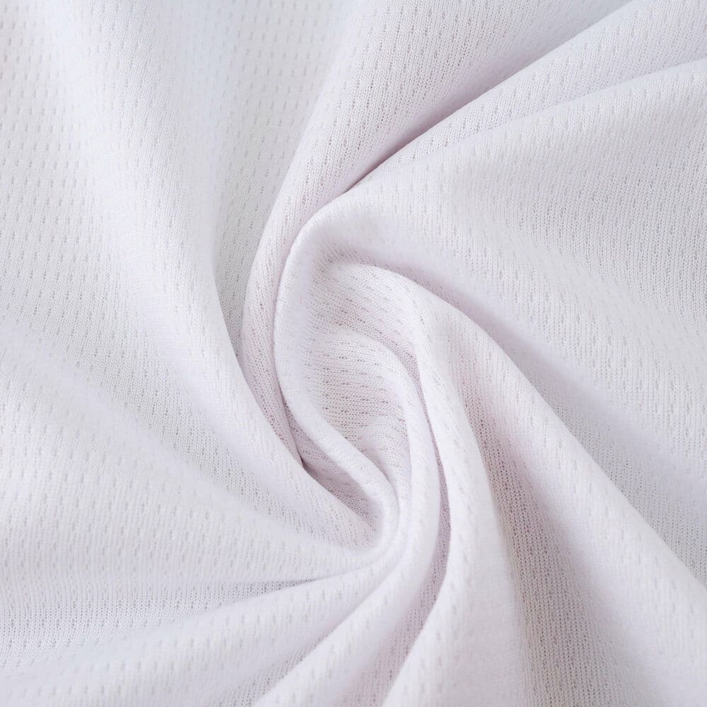 Close-up of white breathable fabric used in the PSV Eindhoven Home 2025/26 Fan Version jersey.