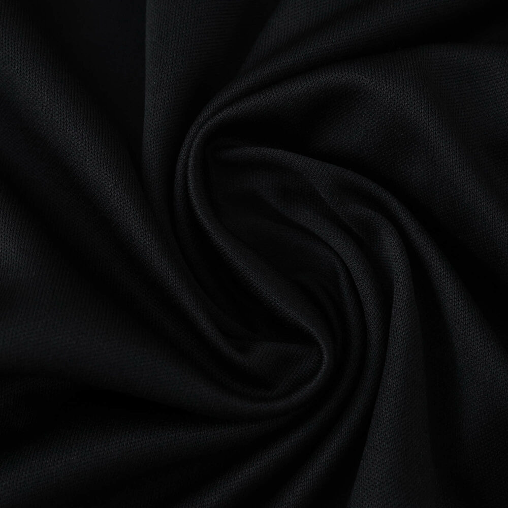 Close-up of black fabric texture from the River Plate Away 2025/26 Fan Version jersey.