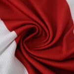 Close-up of River Plate Home 2025/26 Player Version jersey fabric in red and white.