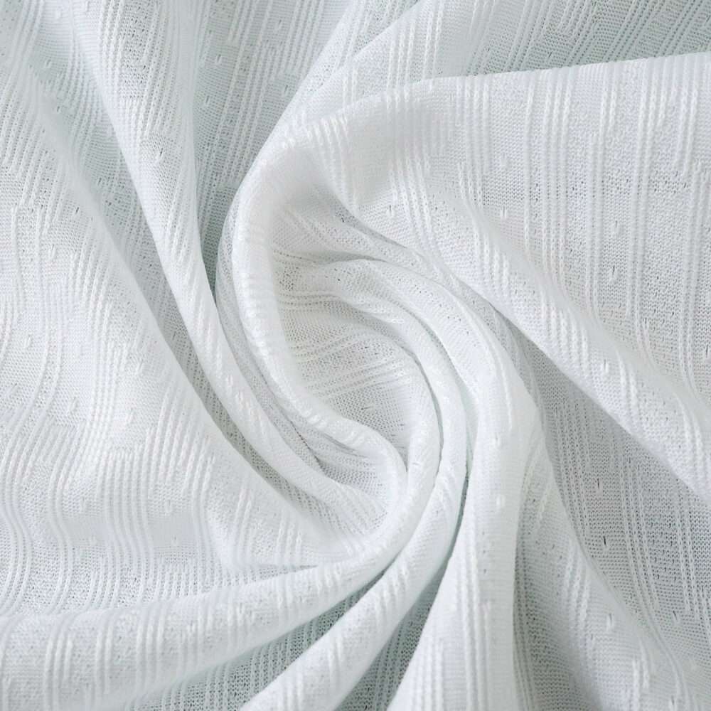 Close-up of the Sporting CP 2025/26 home jersey fabric, showing texture and breathability.