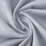 Close-up of the light grey VfL Wolfsburg 2025/26 Away Fan Version jersey fabric.