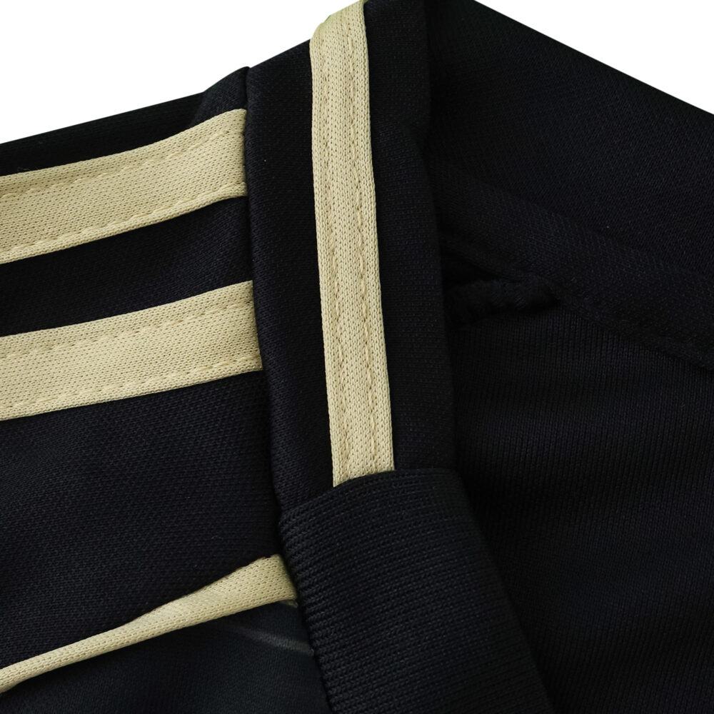 Close-up of the collar and shoulder detailing on the Aberdeen Away 2025/26 Fan Version jersey.