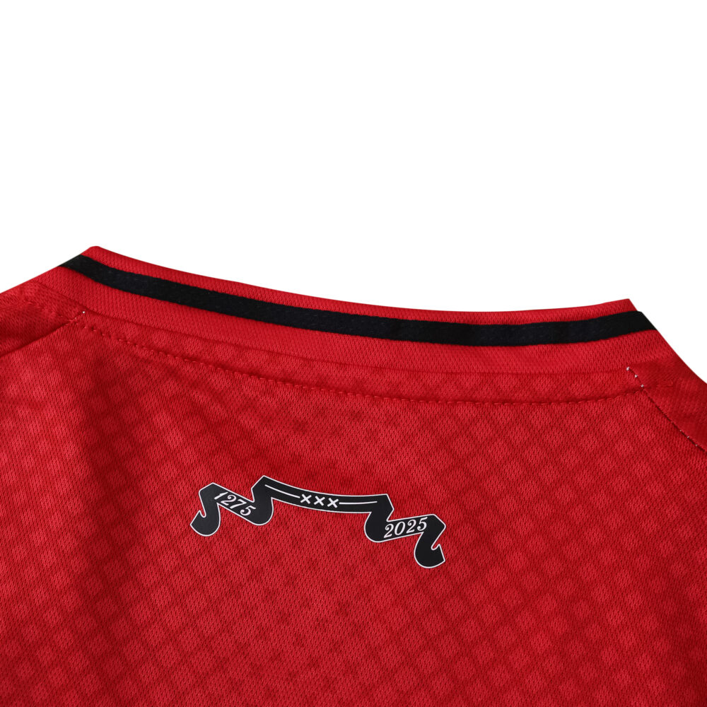 Close-up of the back collar on the Ajax 2025/26 Fan Version jersey featuring a black ribbon design.