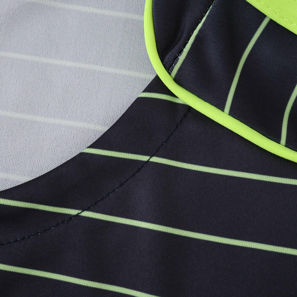 Close-up of the Celtic Away 2025/26 Fan Version jersey featuring light green stripes on dark fabric.