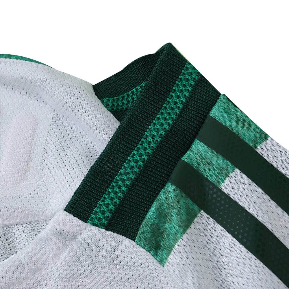 Close-up of the Celtic Home 2025/26 Player Version jersey collar with green and white details.