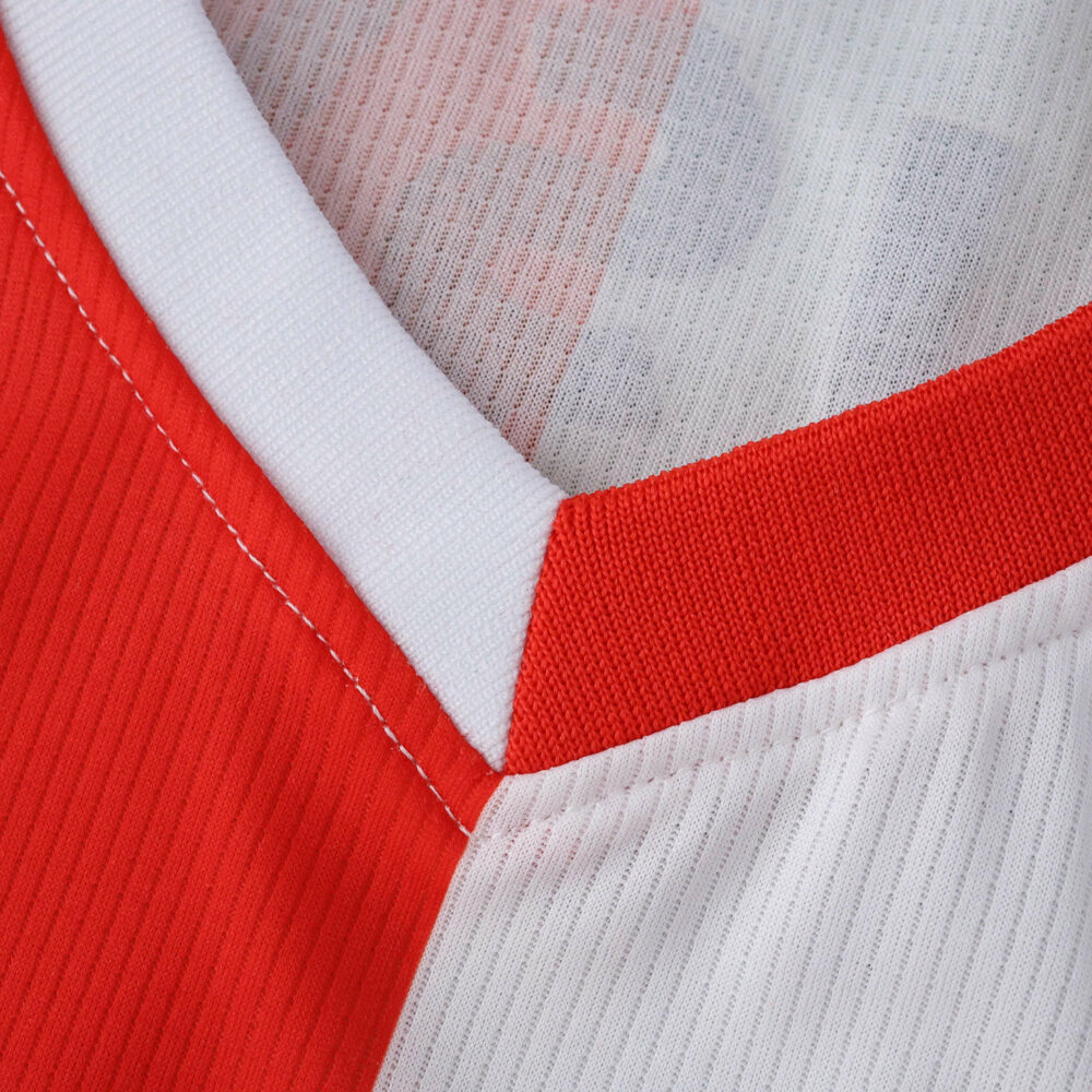 Close-up of the collar and fabric detail on the Feyenoord 2025/26 Home Fan Version jersey.