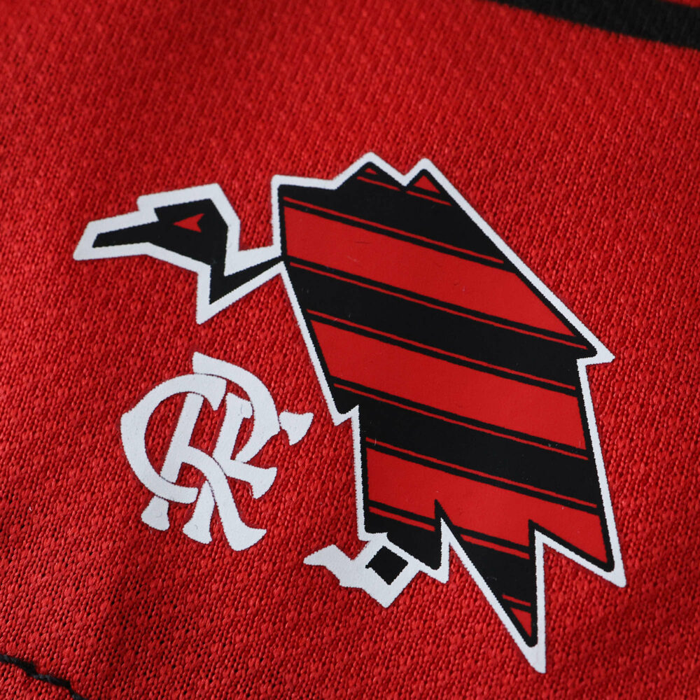 Detail of Flamengo Home 2025/26 Player Version jersey featuring a stylized vulture and club monogram.