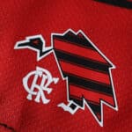 Detail of Flamengo Home 2025/26 Player Version jersey featuring a stylized vulture and club monogram.