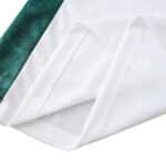Close-up of Fluminense Away 2025/26 Fan Version jersey fabric, showing white mesh texture and green trim.