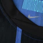 Close-up of Inter Milan Home 2025/26 Player Version jersey collar with Nike logo and blue stripes.