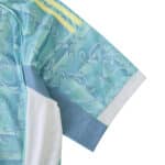 Close-up of the Juventus Away 2025/26 Fan Version jersey sleeve with blue pattern and yellow accents.