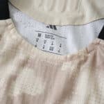 Close-up of the New York Red Bulls 2025/26 away player version jersey collar and size tag.