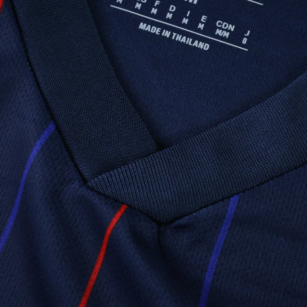 Close-up of Olympique Lyonnais Away 2025/26 Fan Version jersey collar and fabric detail.