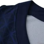 Close-up of the collar and shoulder detail on the Paris Saint-Germain 2025/26 Home Fan Version jersey.