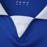 Close-up of the 2025/26 Rangers Home Fan Version jersey collar in blue and white.