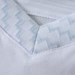 Close-up of the collar detail on the Santos FC 2025/26 Home Player Version jersey, showing fabric pattern.