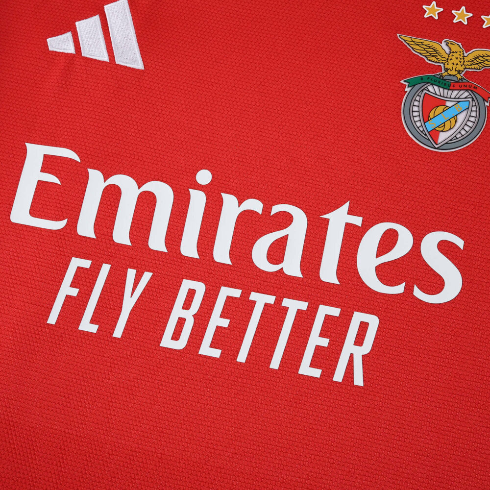 Close-up of SL Benfica 2025/26 home fan jersey showing club crest, sponsor logo, and Adidas branding.
