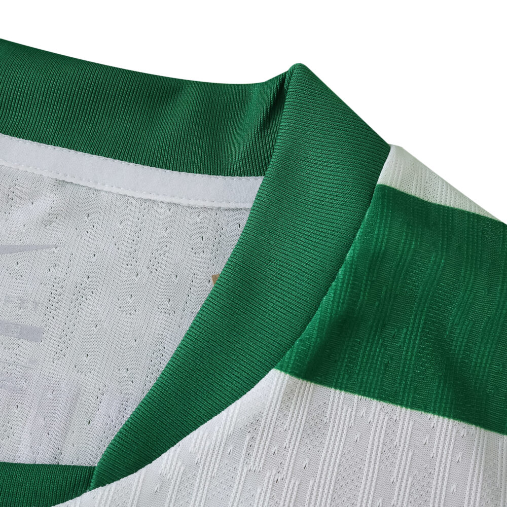 Close-up of the Sporting CP 2025/26 Home Player Version jersey collar with green and white details.